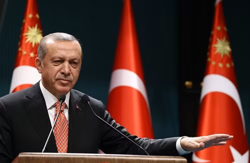 Tổng thống Thổ Nhĩ Kỳ Recep Tayyip Erdogan phát biểu tại Ankara ngày 24/7. AFP/TTXVN