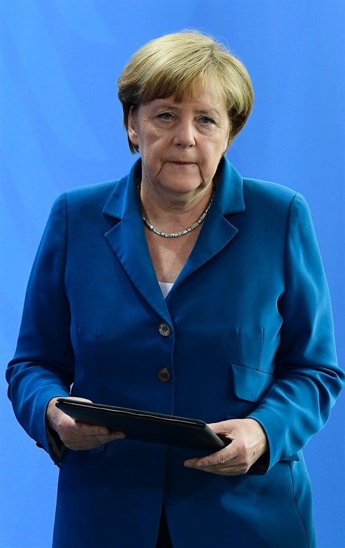 Thủ tướng Đức Angela Merkel lên án vụ xả súng đẫm máu tại Munich. Ảnh: AFP/ TTXVN