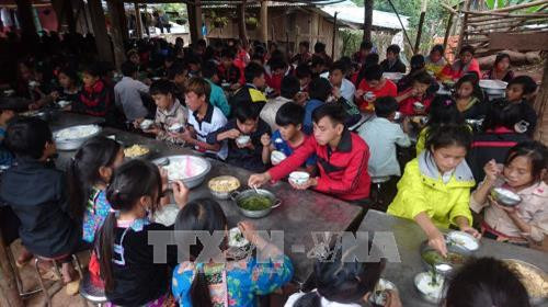 Bữa ăn của học sinh trường Phổ thông Dân tộc bán trú Tiểu học Nậm Ngà. Ảnh: Quang Duy - TTXVN Bữa ăn của học sinh trường Phổ thông Dân tộc bán trú Tiểu học Nậm Ngà. Ảnh: Quang Duy - TTXVN