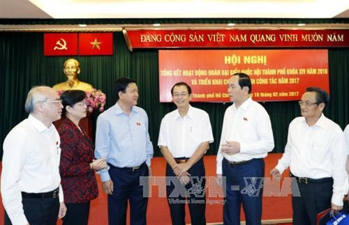 Chủ tịch nước Trần Đại Quang với các đại biểu dự hội nghị. Ảnh: Nhan Sáng-TTXVN Chủ tịch nước Trần Đại Quang với các đại biểu dự hội nghị. Ảnh: Nhan Sáng-TTXVN