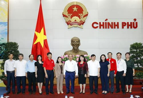 Thủ tướng Nguyễn Xuân Phúc với các đại biểu. Ảnh: Thống Nhất - TTXVN Thủ tướng Nguyễn Xuân Phúc với các đại biểu. Ảnh: Thống Nhất - TTXVN