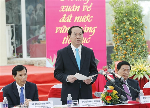 Chủ tịch nước Trần Đại Quang chúc Tết cộng đồng các dân tộc Việt Nam và bà con kiều bào tham dự ngày hội. Ảnh: Nhan Sáng-TTXVN