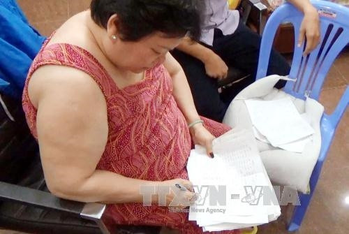 Đối tượng Nguyễn Thị Điệp bị bắt giữ với hành vi thầu đề. Ảnh: Tuấn Anh-TTXVN Phát