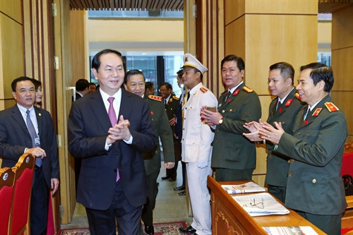 Chủ tịch nước Trần Đại Quang đến dự hội nghị. Ảnh: Nhan Sáng-TTXVN