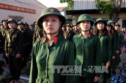 Thanh niên thành phố lên đường nhập ngũ tại điểm giao quân Quận 9, Thành phố Hồ Chí Minh. Ảnh: Thế Anh - TTXVN