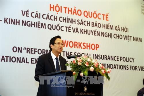 Bộ trưởng Bộ Lao động – Thương binh và Xã hội Đào Ngọc Dung khai mạc Hội thảo. Ảnh: Anh Tuấn – TTXVN