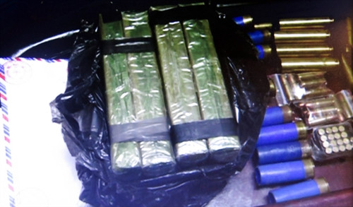 Tang vật bị thu giữ. Ảnh: Văn Đạt – TTXVN Tang vật bị thu giữ. Ảnh: Văn Đạt – TTXVN