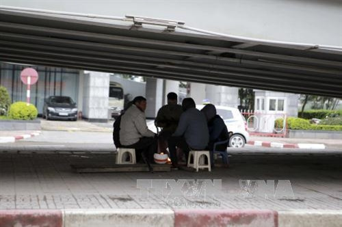 Người lao động Hà Nội trong đợt giá rét kỷ lục của mùa đông ảnh 3