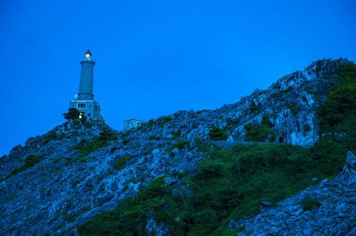 Ngọn hải đăng Long Châu nằm ở độ cao 180m so với mặt nước biển. Ảnh: Minh Đức - TTXVN Ngọn hải đăng Long Châu nằm ở độ cao 180m so với mặt nước biển. Ảnh: Minh Đức - TTXVN