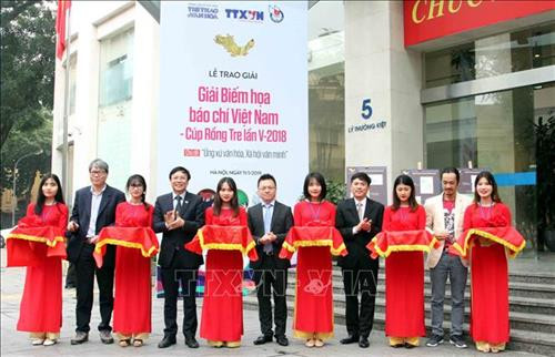 Lễ cắt băng khai mạc triển lãm. Ảnh: Quang Quyết-TTXVN Lễ cắt băng khai mạc triển lãm. Ảnh: Quang Quyết-TTXVN