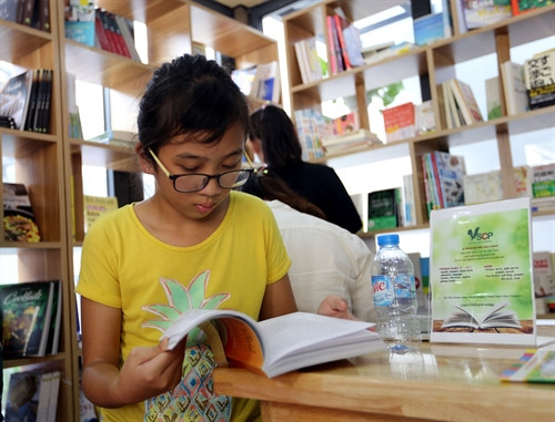 Độc giả nhí tại Phố Sách. Ảnh: Danh Lam Độc giả nhí tại Phố Sách. Ảnh: Danh Lam