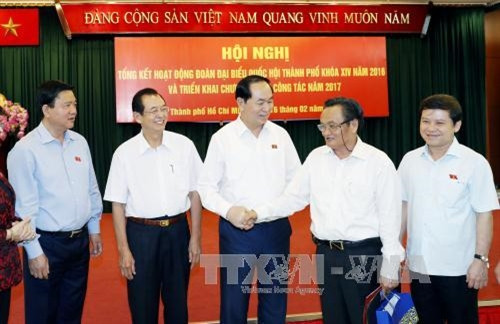 Chủ tịch nước Trần Đại Quang với các đại biểu dự hội nghị. Ảnh: Nhan Sáng-TTXVN Chủ tịch nước Trần Đại Quang với các đại biểu dự hội nghị. Ảnh: Nhan Sáng-TTXVN