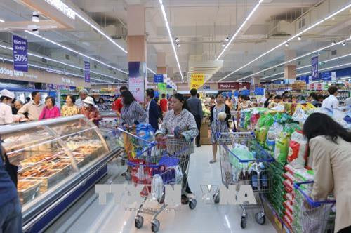 Người tiêu dùng mua sắm tại hệ thống Co.op mart (Saigon Co.op). Ảnh: Thanh Vũ-TTXVN Người tiêu dùng mua sắm tại hệ thống Co.op mart (Saigon Co.op). Ảnh: Thanh Vũ-TTXVN