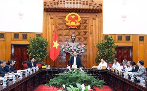 Thủ tướng Nguyễn Xuân Phúc chủ trì cuộc họp đẩy mạnh thu mua lúa gạo. Ảnh: Thống Nhất – TTXVN