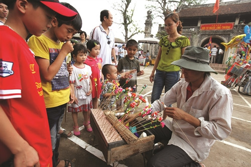 Nặn tò he - một nét văn hóa dân gian diễn ra trong ngày hội
