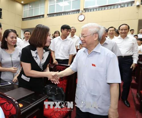 Tổng Bí thư Nguyễn Phú Trọng tiếp xúc cử tri quận Thanh Xuân và Hà Đông. Ảnh: Trí Dũng –TTXVN
