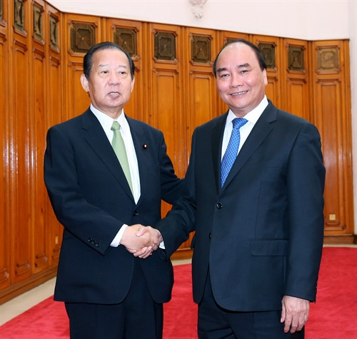 Thủ tướng Nguyễn Xuân Phúc tiếp ông Nikai Toshihiro Tổng thư Ký Đảng Dân chủ Tự do Nhật Bản (LDP), kiêm Chủ tịch Liên minh Nghị sỹ Hữu nghị Nhật - Việt. Ảnh: Thống Nhất-TTXVN