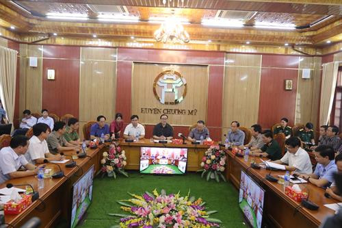 Bí thư Thành ủy Hà Nội Hoàng Trung Hải nghe lãnh đạo Ủy ban Nhân dân Thành phố Hà Nội, các sở, ban, ngành và huyện Chương Mỹ báo cáo nhanh về công tác ứng phó với mưa lũ thời gian qua trên địa bàn.