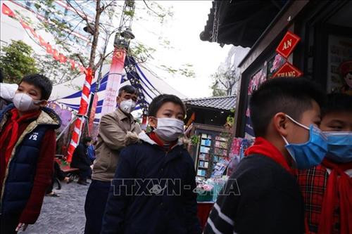 Học sinh, trẻ em được trang bị khẩu trang khi đến Phố sách 19/12, chiều 31/1/2020. Ảnh: Lâm Khánh - TTXVN Học sinh, trẻ em được trang bị khẩu trang khi đến Phố sách 19/12, chiều 31/1/2020. Ảnh: Lâm Khánh - TTXVN