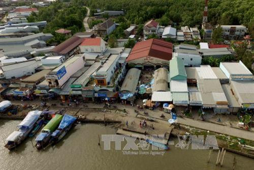 Chợ Đất Mũi. Ảnh: An Hiếu - TTXVN Chợ Đất Mũi. Ảnh: An Hiếu - TTXVN