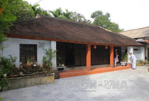 Một ngôi nhà rường cổ ở làng Phước Tích. Ảnh: Hồ Cầu - TTXVN