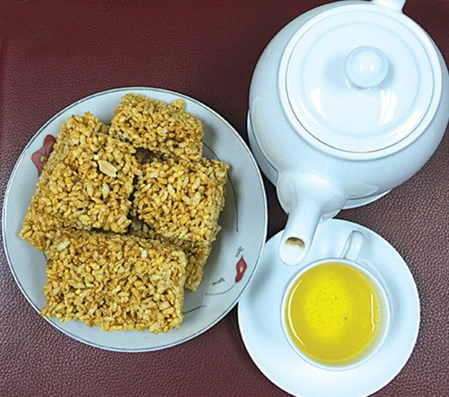 Khẩu sli, món bánh bỏng đặc biệt của người Nùng.