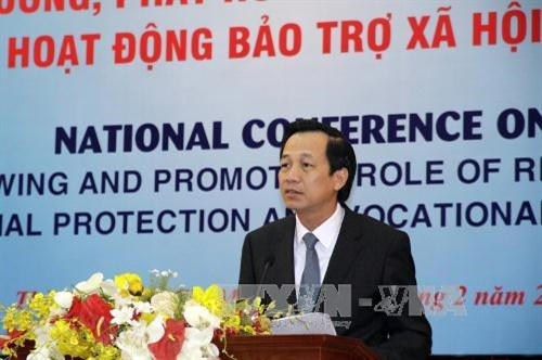 Bộ trưởng Bộ Lao động-Thương binh và Xã hội Đào Ngọc Dung phát biểu khai mạc hội nghị. Ảnh: Thế Anh - TTXVN