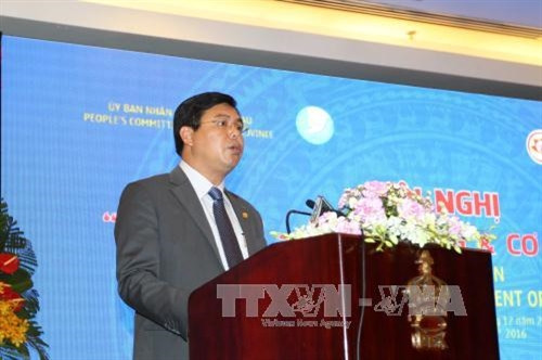 Chủ tịch UBND tỉnh Cà Mau Nguyễn Tiến Hải phát biểu khai mạc hội nghị. Ảnh: Thanh Vũ-TTXVN