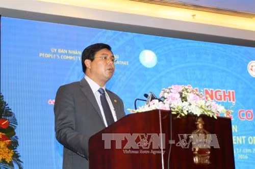 Chủ tịch UBND tỉnh Cà Mau Nguyễn Tiến Hải phát biểu khai mạc hội nghị. Ảnh: Thanh Vũ-TTXVN