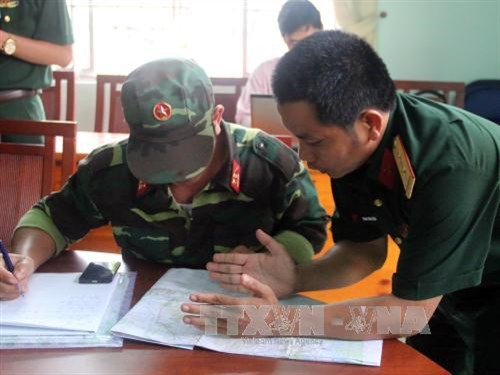 Lực lượng chức năng đang khoanh vùng tìm kiếm máy bay mất tích. Ảnh: Đoàn Mạnh Dương/TTXVN