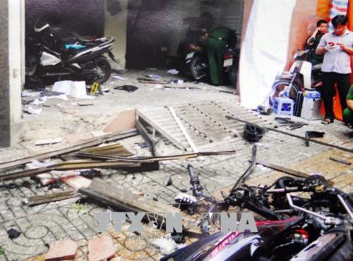 Hiện trường vụ nổ tại trụ sở Công an Phường 12 quận Tân Bình ngày 20/6. Ảnh: Thành Chung – TTXVN Hiện trường vụ nổ tại trụ sở Công an Phường 12 quận Tân Bình ngày 20/6. Ảnh: Thành Chung – TTXVN