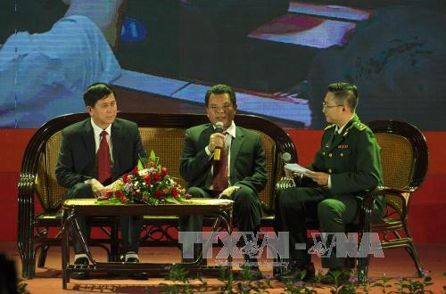 Giao lưu giữa lãnh đạo hai tỉnh biên giới Hủa Phăn (Lào) và Sơn La (Việt Nam). Ảnh: Nguyễn Cường - TTXVN Giao lưu giữa lãnh đạo hai tỉnh biên giới Hủa Phăn (Lào) và Sơn La (Việt Nam). Ảnh: Nguyễn Cường - TTXVN