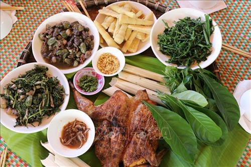 Ẩm thực đậm đà bản sắc dân tộc Bahnar trong homestay của A Ngưi. Ảnh: Hồng Điệp - TTXVN Ẩm thực đậm đà bản sắc dân tộc Bahnar trong homestay của A Ngưi. Ảnh: Hồng Điệp - TTXVN