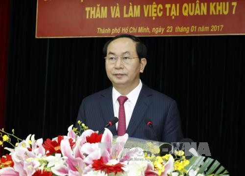Chủ tịch nước Trần Đại Quang phát biểu tại buổi làm việc và chúc Tết các lực lượng vũ trang Quân khu 7. Ảnh: Nhan Sáng-TTXVN