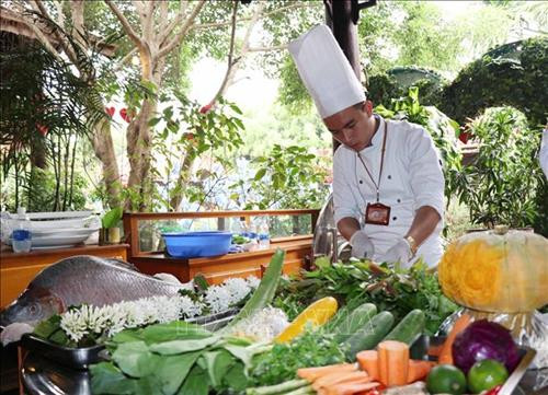 Các đội thi chế biến món ăn. Ảnh: Tuấn Anh – TTXVN Các đội thi chế biến món ăn. Ảnh: Tuấn Anh – TTXVN