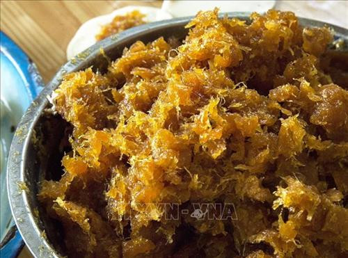 Nhân khóm Tắc Cậu để làm bánh. Ảnh: Hồng Đạt - TTXVN