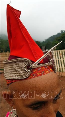 Trang sức của dân tộc Dao, ngành Dao đỏ. Ảnh: Phan Tuấn Anh – TTXVN Trang sức của dân tộc Dao, ngành Dao đỏ. Ảnh: Phan Tuấn Anh – TTXVN