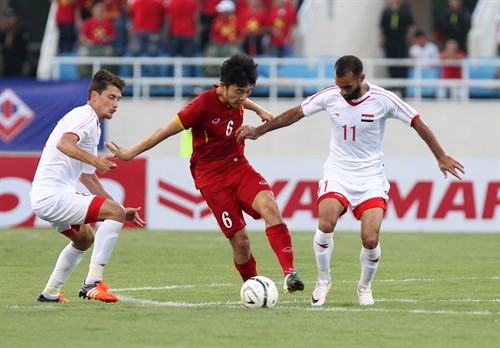 Pha cầm bóng đột phá của Xuân Trường (giữa-Việt Nam). Ảnh: Quốc Khánh - TTXVN Pha cầm bóng đột phá của Xuân Trường (giữa-Việt Nam). Ảnh: Quốc Khánh - TTXVN