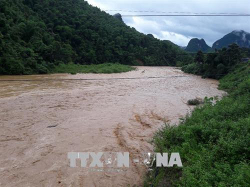 Nước sông dâng cao tại xã Na Mèo, huyện Quan Sơn. Ảnh: TTXVN/phát Nước sông dâng cao tại xã Na Mèo, huyện Quan Sơn. Ảnh: TTXVN/phát