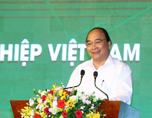 Thủ tướng Nguyễn Xuân Phúc phát biểu tại cuộc đối thoại với các doanh nghiệp.Ảnh: Thống Nhất-TTXVN