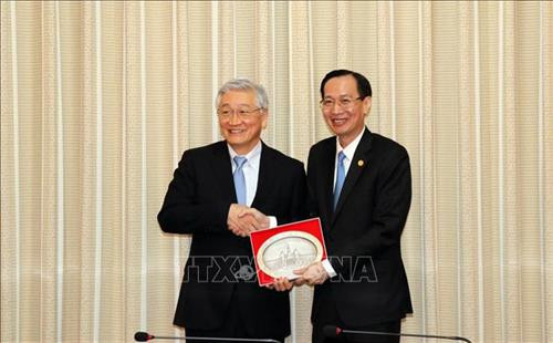 Ông Lê Thanh Liêm và ông Ken Kawai (trái) tại buổi tiếp. Ảnh: Xuân Khu-TTXVN