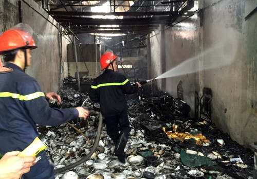 Hiện trường vụ hỏa hoạn ở Tây Mỗ ( Hà Nội), sáng 20/2 . Ảnh: Phạm Kiên- TTXVN Hiện trường vụ hỏa hoạn ở Tây Mỗ ( Hà Nội), sáng 20/2 . Ảnh: Phạm Kiên- TTXVN