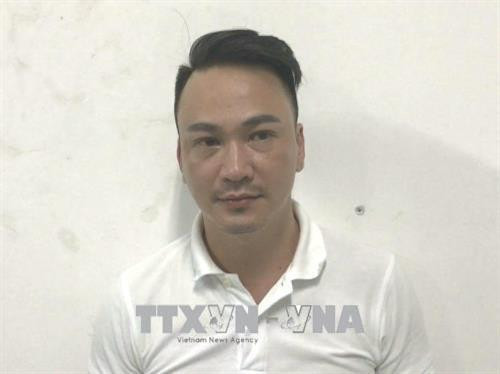 Đối tượng Nguyễn Hữu Sinh, quản lý nhà hàng Ruby bị Công an tạm giữ Ảnh: Thành Chung - TTXVN