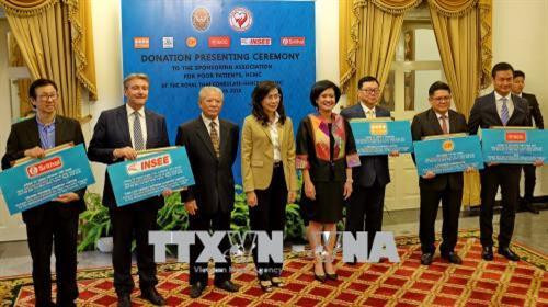 Tại buổi lễ đại diện các doanh nghiệp Thái Lan thông qua vận động từ Tổng Lãnh sự quán Thái Lan tham gia đóng góp kinh phí hỗ trợ các hoạt động từ thiện xã hội của SAPP. Ảnh : Thế Anh-TTXVN