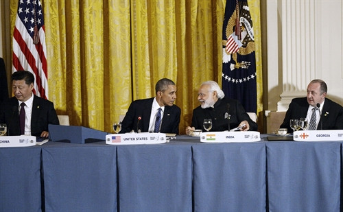 Tổng thống Mỹ Barack Obama (thứ hai, trái) và các đại biểu tại Hội nghị thượng đỉnh An ninh hạt nhân lần thứ 4. AFP/ TTXVN