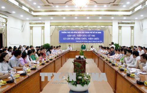 Quang cảnh buổi gặp gỡ, tiếp xúc cử tri. Ảnh: Tiến Lực – TTXVN Quang cảnh buổi gặp gỡ, tiếp xúc cử tri. Ảnh: Tiến Lực – TTXVN