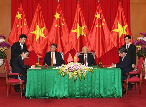 Tổng Bí thư Nguyễn Phú Trọng và Tổng Bí thư, Chủ tịch Trung Quốc Tập Cận Bình chứng kiến Lễ ký kết Bản ghi nhớ về việc ưu hóa thiết kế dự án Cung Hữu nghị Việt – Trung giữa Bộ Kế hoạch và Đầu tư nước Cộng hòa xã hội Chủ nghĩa Việt Nam và Bộ Thương mại nước Cộng hòa Nhân dân Trung Hoa. Ảnh: Trí Dũng- TTXVN Tổng Bí thư Nguyễn Phú Trọng và Tổng Bí thư, Chủ tịch Trung Quốc Tập Cận Bình chứng kiến Lễ ký kết Bản ghi nhớ về việc ưu hóa thiết kế dự án Cung Hữu nghị Việt – Trung giữa Bộ Kế hoạch và Đầu tư nước Cộng hòa xã hội Chủ nghĩa Việt Nam và Bộ Thương mại nước Cộng hòa Nhân dân Trung Hoa. Ảnh: Trí Dũng- TTXVN