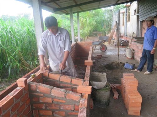 Anh Nguyễn Văn Sang đầu tư mở rộng trang trại nuôi bò sữa