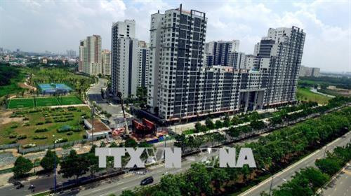 Dự án tái định cư Khu đô thị mới Thủ Thiêm chuyển sang thành dự án nhà ở thương mại. Ảnh: Quang Nhựt - TTXVN Dự án tái định cư Khu đô thị mới Thủ Thiêm chuyển sang thành dự án nhà ở thương mại. Ảnh: Quang Nhựt - TTXVN
