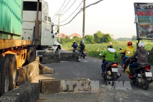 Hiện truờng vụ tai nạn. Ảnh: Mạnh Linh-TTXVN